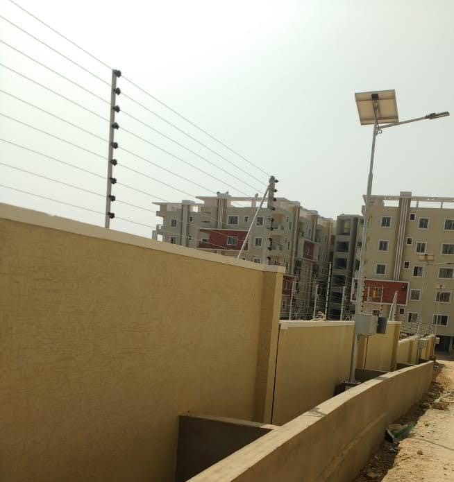 Building wall solar fencing installation