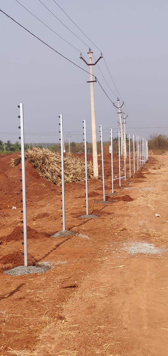Solar fence posts installed in agricultural field