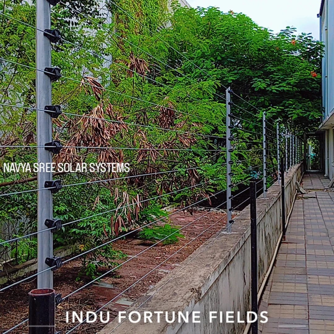 Apartment walkway boundary with solar fence wiring