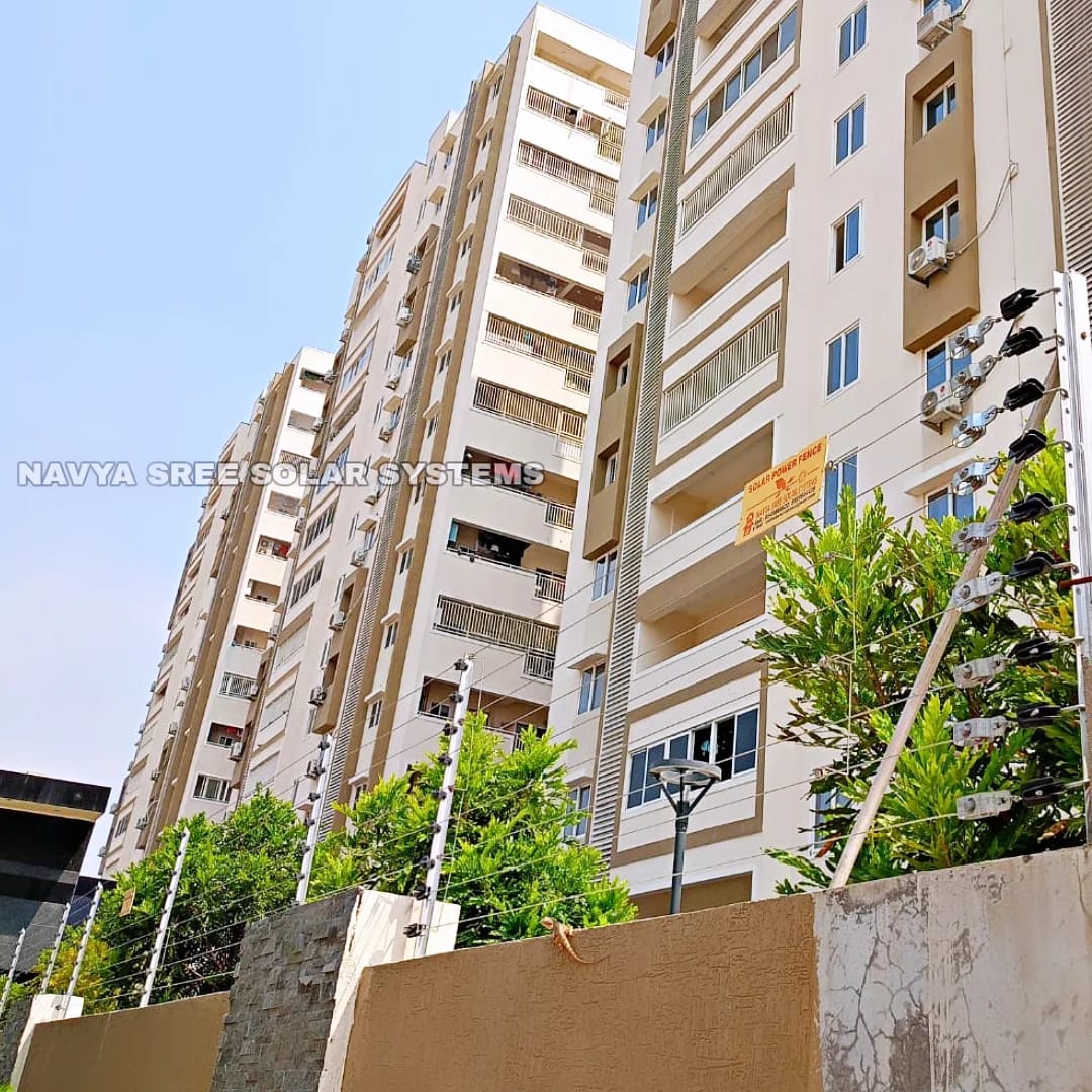 High-rise apartment compound with solar fencing