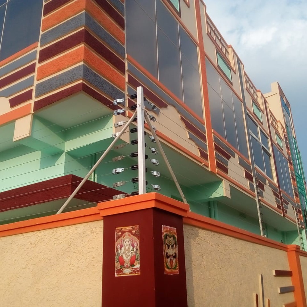 Corner solar fencing installed on residential compound wall